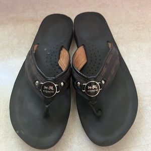 Coach flip-flop sandals.